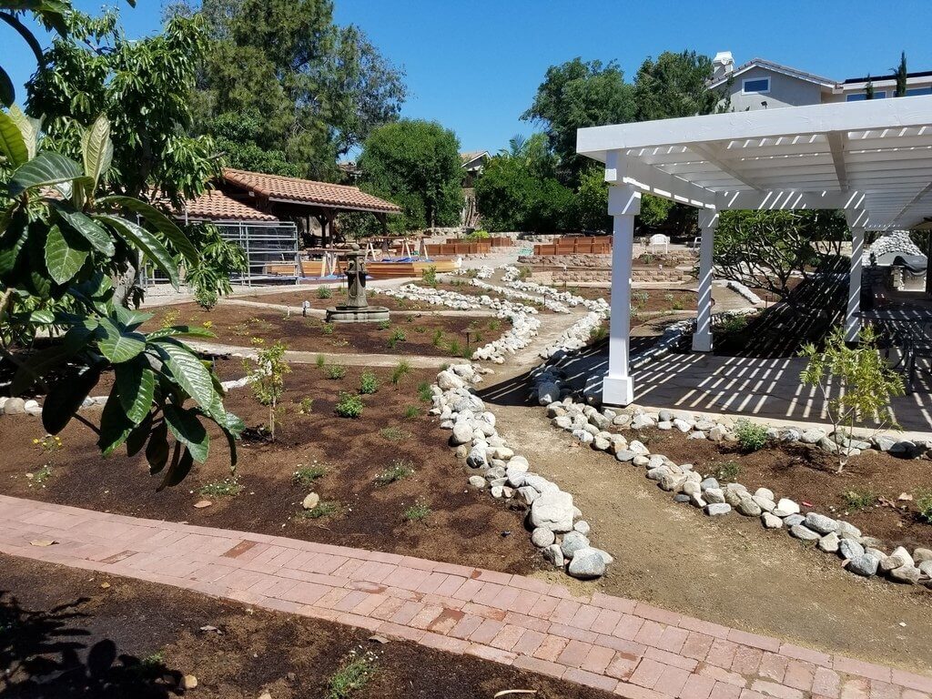 Expert installing irrigation system